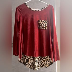 KMC USA women’s size small cheetah and burgundy faux suede top.